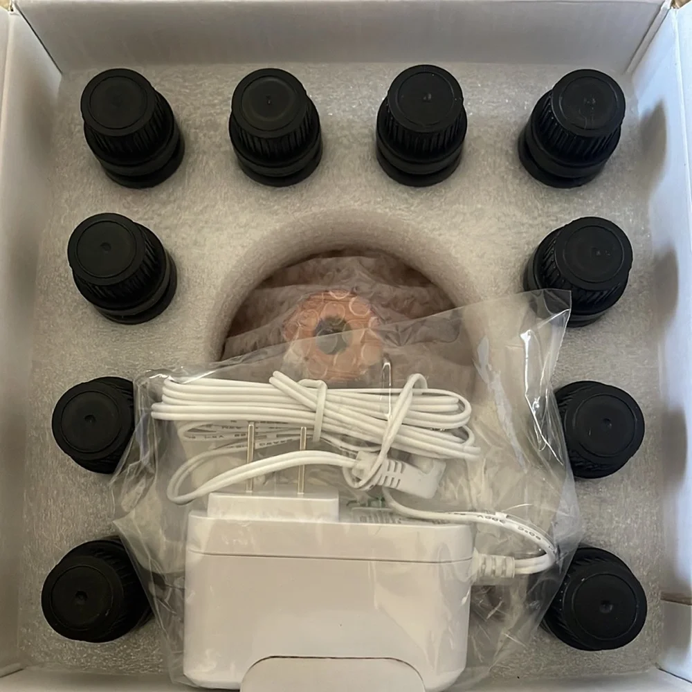 NIB Pure Daily Care Ultrasonic Aromatherapy Diffuser with 10 Pure Essential Oils